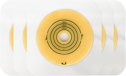 Yellow circular medical device on a white background